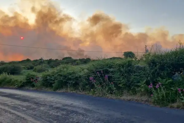 Fire fighters tackle gorse fire visible from Galway City